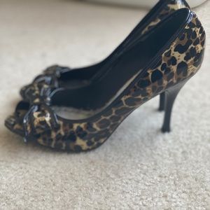 BCBG leopard patent pumps
